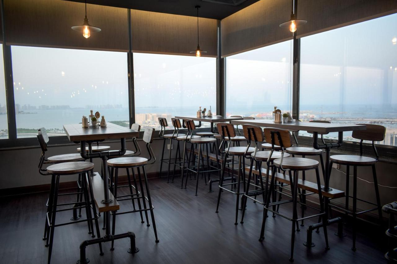 ซารายา คอร์นิเช โฮเต็ล Hotel โดฮา ภายนอก รูปภาพ The interior of the restaurant
